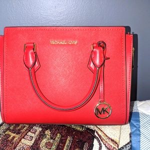 Red "Micheal Kors" hand bag